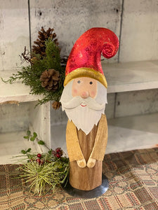Wooden Santa with a metal Red Hat