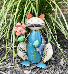 TIN CAT HOLDING A FLOWER