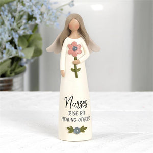 “NURSES RISE BY HEALING” ANGEL WITH FLOWER