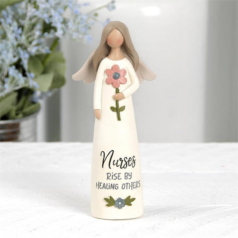 “NURSES RISE BY HEALING” ANGEL WITH FLOWER